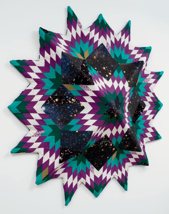 Sanford Biggers, Sextant, 2024. Antique quilt, assorted textiles, and mixed media, 63-1/2 × 63-1/2 × 12 inches